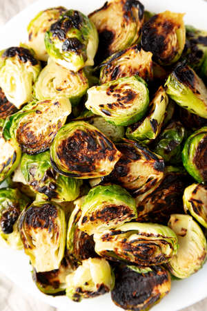 Homemade Roasted Brussel Sprouts on a Plate, top view. Flat lay, overhead, from above. close-up.の写真素材