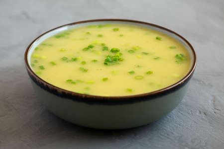 Homemade Potato Leek Soup in a Bowl on a gray background, side view.の写真素材