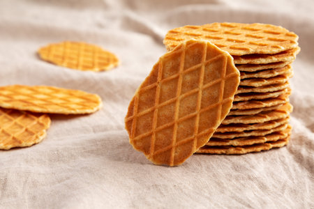 Homemade Waffle Crisps in a stack, side view. close-up.