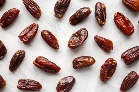 Pitted Organic Dates on gray background, top view. Flat lay, overhead, from above.の写真素材