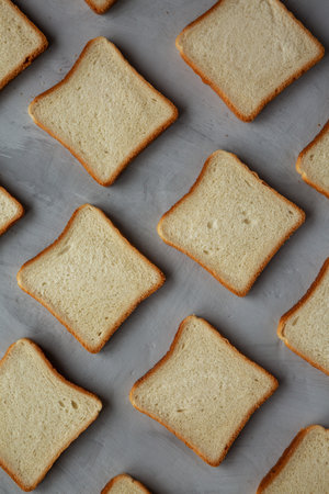 Sliced Whole Wheat White Bread on a gray background, top view. Flat lay, overhead, from above.の写真素材