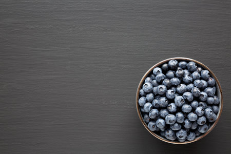 Organic Blueberries in a Bowl, top view. Flat lay, overhead, from above. copyspace.の写真素材