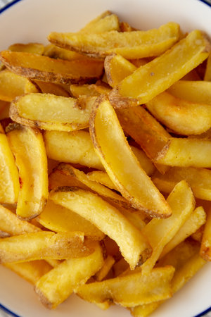 Homemade French Fries on a Plate, top view. Flat lay, overhead, from above. close-up.