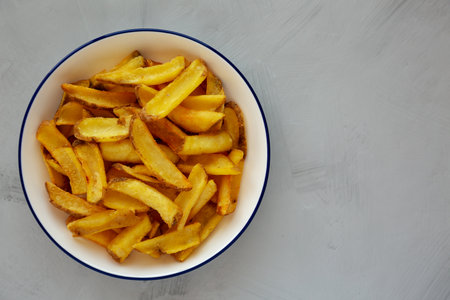 Homemade French Fries on a Plate, top view. Flat lay, overhead, from above. copyspace.の写真素材