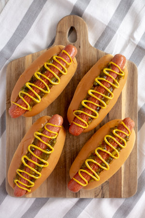 Homemade Gourmet Hot Dogs with Sweet Relish and Mustard, top view. Flat lay, overhead, from above.の写真素材