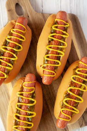 Homemade Gourmet Hot Dogs with Sweet Relish and Mustard, top view. Flat lay, overhead, from above.の写真素材