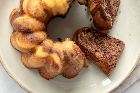 Homemade Marble Cake on a Plate, top view. Close-up.の写真素材