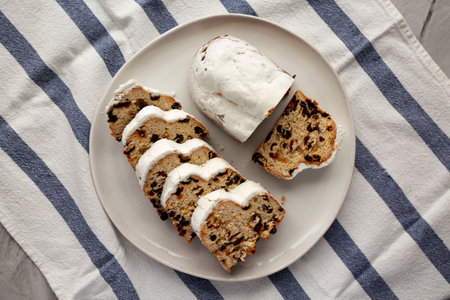 Homemade Christmas Stollen Bread on a Plate, top view. Flat lay, overhead, from above.