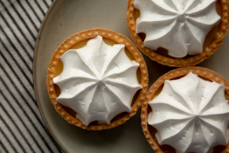 Homemade Lemon Tartlets on a Plate, top view. Flat lay, overhead, from above. Close-up.の写真素材