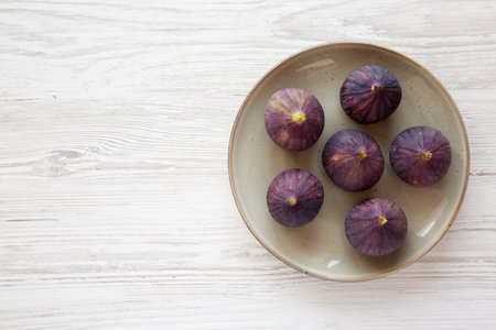 Raw Organic Figs on a Plate, top view. Copy space.の写真素材