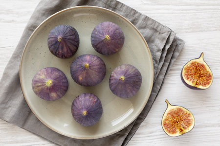 Raw Organic Figs on a Plate, top view.