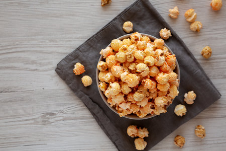 Homemade Crunchy Chicago-Style Popcorn with Caramel and Cheese in a Bowl, top view.の写真素材