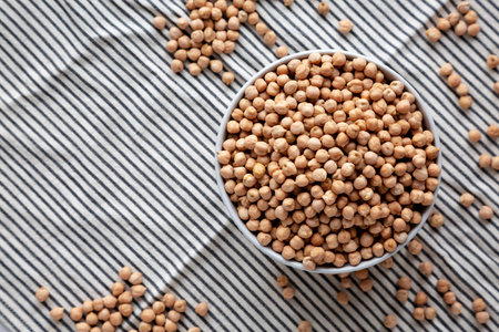 Dry Organic Chickpeas in a Bowl, top view. Copy space.の写真素材