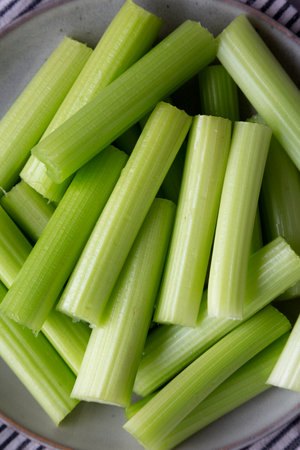 Raw Organic Celery Sticks on a Plate, top view.の写真素材