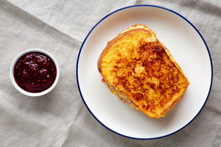 Homemade French Monte Cristo Sandwich with Raspberry Jam, top view. Flat lay, overhead, from above.