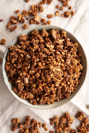 Homemade Healthy Chocolate Granola in a Bowl, top view.