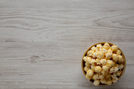 Homemade Butter Popcorn with Sea Salt in a Bowl, top view. Copy space.の写真素材