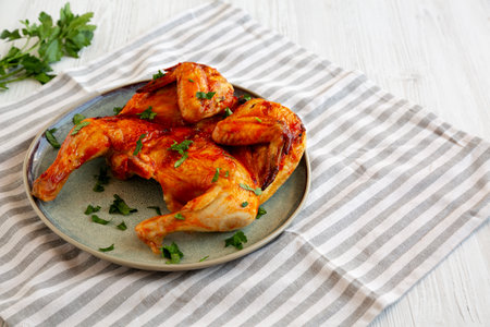 Healthy Homemade Spatchcocked Grilled Piri-Piri Chicken with Parsleyの写真素材