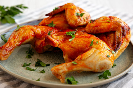Healthy Homemade Spatchcocked Grilled Piri-Piri Chicken with Parsleyの写真素材