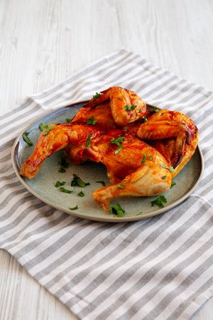 Healthy Homemade Spatchcocked Grilled Piri-Piri Chicken with Parsleyの写真素材