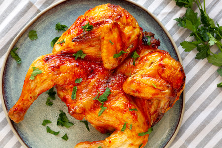 Healthy Homemade Spatchcocked Grilled Piri-Piri Chicken with Parsleyの写真素材