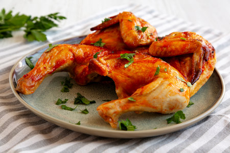 Healthy Homemade Spatchcocked Grilled Piri-Piri Chicken with Parsleyの写真素材