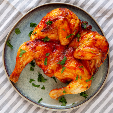 Healthy Homemade Spatchcocked Grilled Piri-Piri Chicken with Parsleyの写真素材