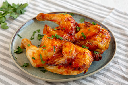 Healthy Homemade Spatchcocked Grilled Piri-Piri Chicken with Parsleyの写真素材