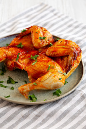 Healthy Homemade Spatchcocked Grilled Piri-Piri Chicken with Parsleyの写真素材