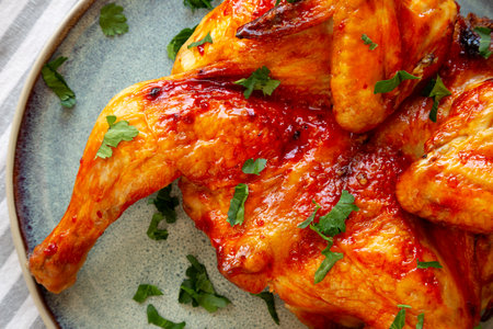 Healthy Homemade Spatchcocked Grilled Piri-Piri Chicken with Parsleyの写真素材