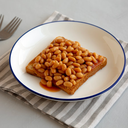 Homemade English Beans on Toast, side view.の写真素材