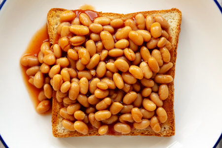 Homemade English Beans on Toast, top view. Close-up.の写真素材