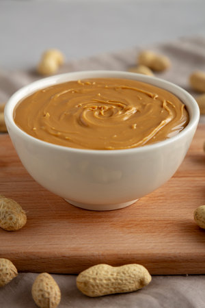Organic Peanut Butter in a Bowl, side view.の写真素材