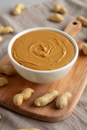 Organic Peanut Butter in a Bowl, side view.の写真素材