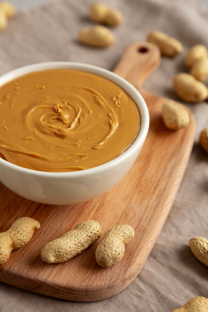 Organic Peanut Butter in a Bowl, side view.の写真素材
