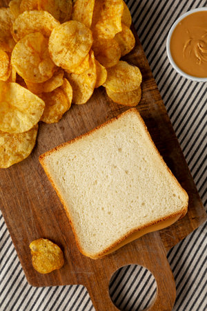 Homemade Peanut Butter Sandwich on a Wooden Board, top view. Close-up.の写真素材