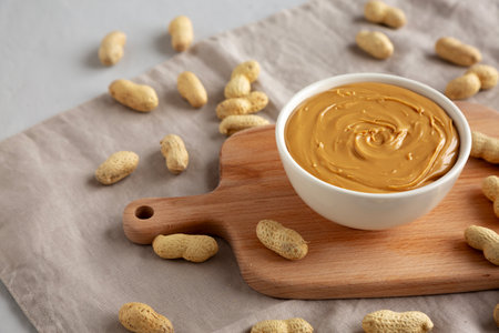 Organic Peanut Butter in a Bowl, side view.の写真素材