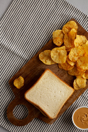 Homemade Peanut Butter Sandwich on a Wooden Board, top view. Copy space.の写真素材