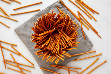 Organic Salty Pretzel Sticks in a Bowl, top view.の写真素材