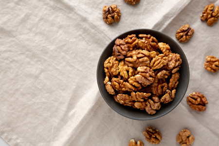 Raw Walnut Halfs in a Bowl, top view. Copy space.の写真素材