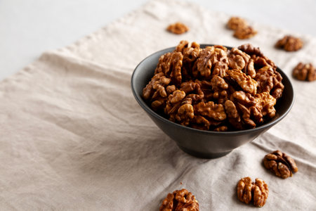 Raw Walnut Halfs in a Bowl, side view. Copy space.の写真素材