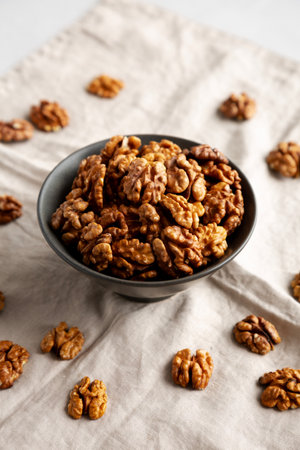 Raw Walnut Halfs in a Bowl, side view.の写真素材