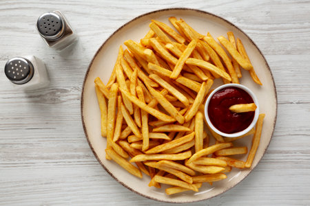 Homemade Golden French Fries with Ketchup, top view.の写真素材