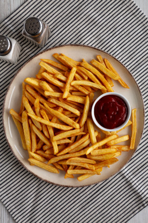 Homemade Golden French Fries with Ketchup, top view.の写真素材