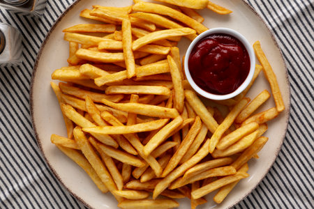 Homemade Golden French Fries with Ketchup, top view.の写真素材