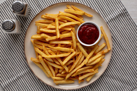 Homemade Golden French Fries with Ketchup, top view.の写真素材