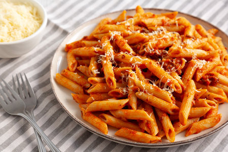 Homemade Pasta Bolognese with Cheese on a Plate, side view.の写真素材