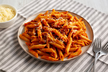 Homemade Pasta Bolognese with Cheese on a Plate, side view.の写真素材