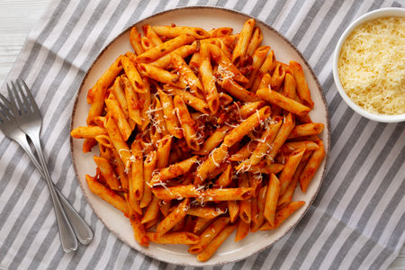 Homemade Pasta Bolognese with Cheese on a Plate, top view.の写真素材