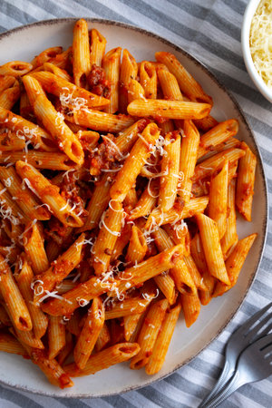 Homemade Pasta Bolognese with Cheese on a Plate, top view.の写真素材